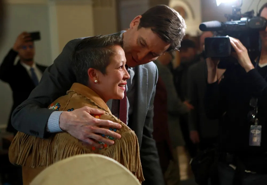 BC flake premier David Eby pandering to NDP DEI wackjob Melanie Mark